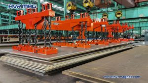 Electro permanent lifting magnets for multiple steel plate unloading