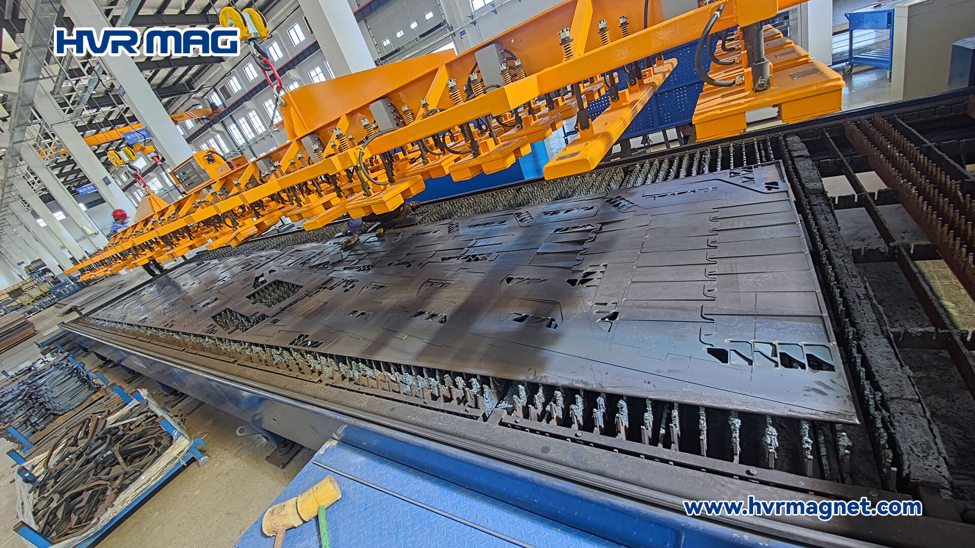 Safe and Efficient Loading Steel Plates for Laser Cutting System